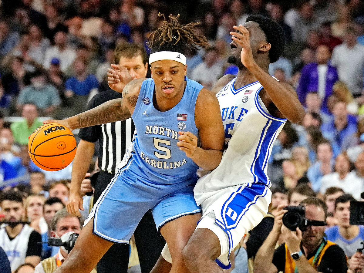UNC’s Armando Bacot dribbles vs. Duke’s Mark Williams